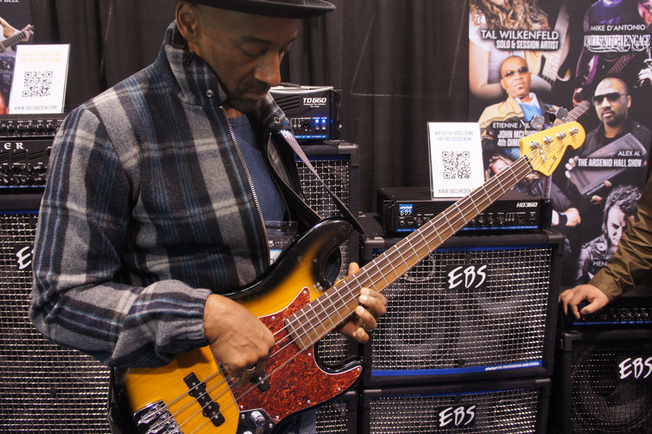 Marcus Miller checking out EBS gear and a Sandberg bass.